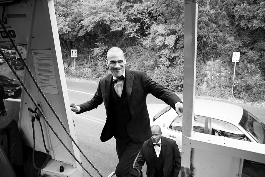 Grooms get on the boat